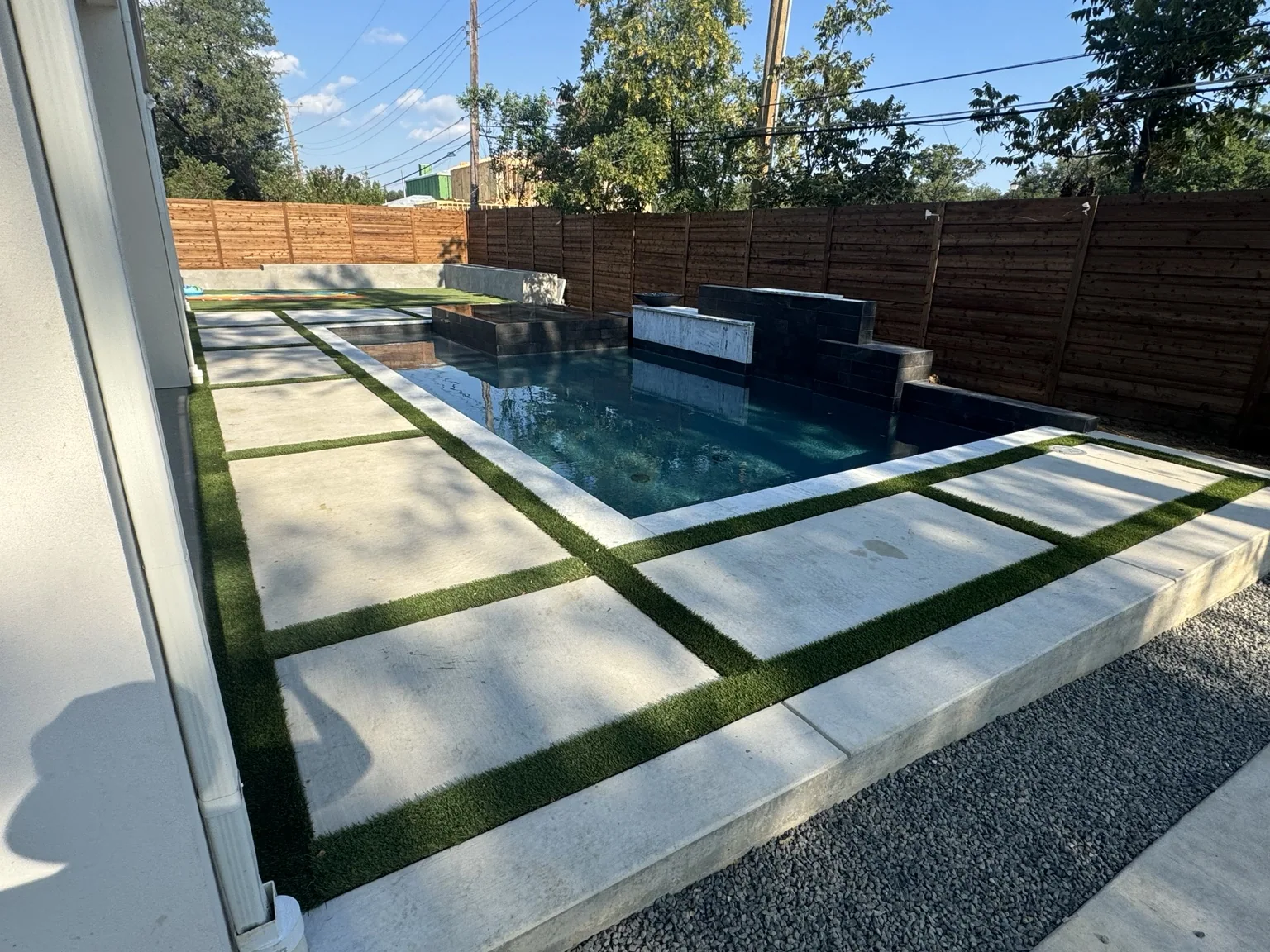 Poolside hardscape and turf
