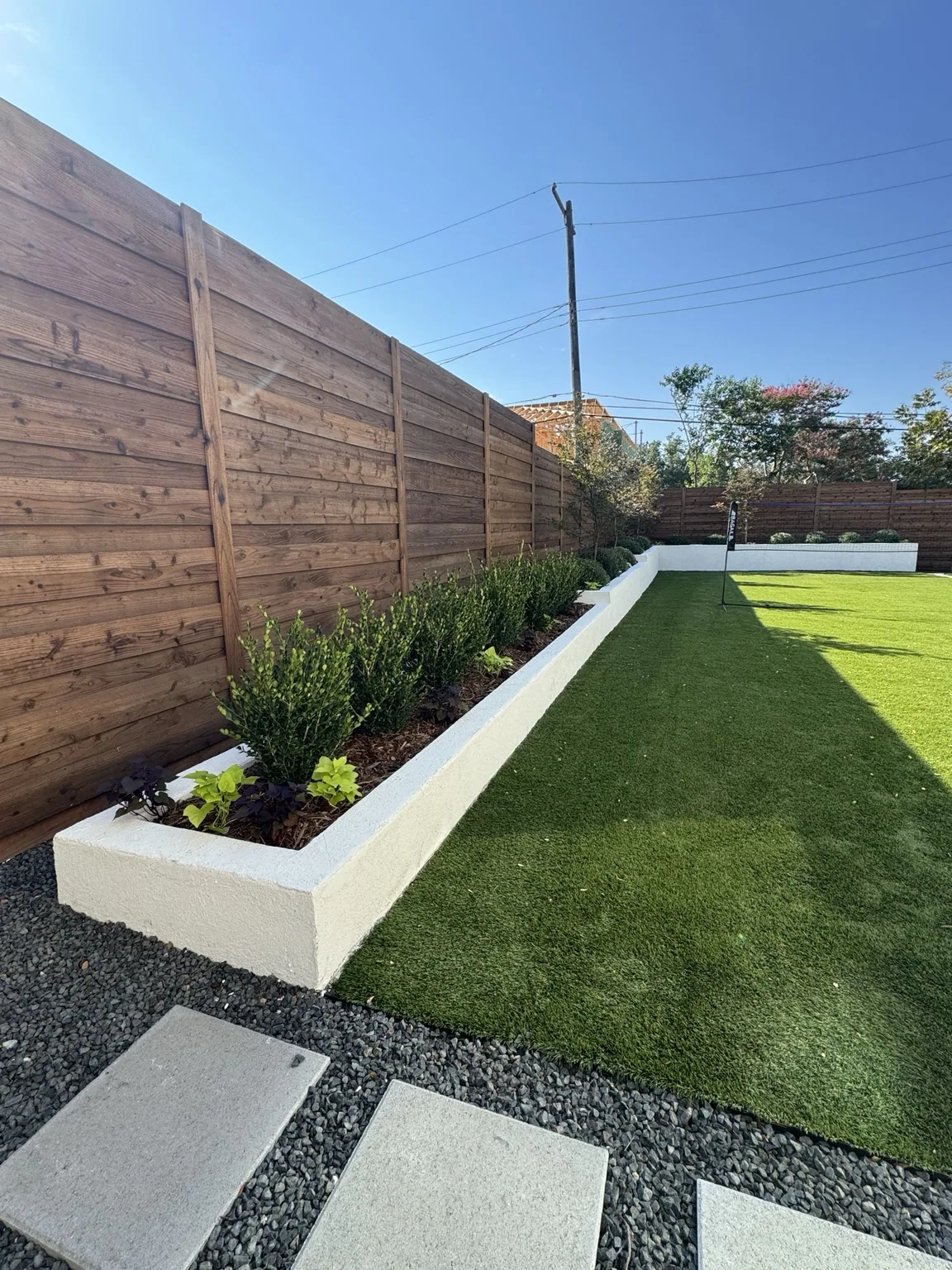 Landscape planting beds and turf