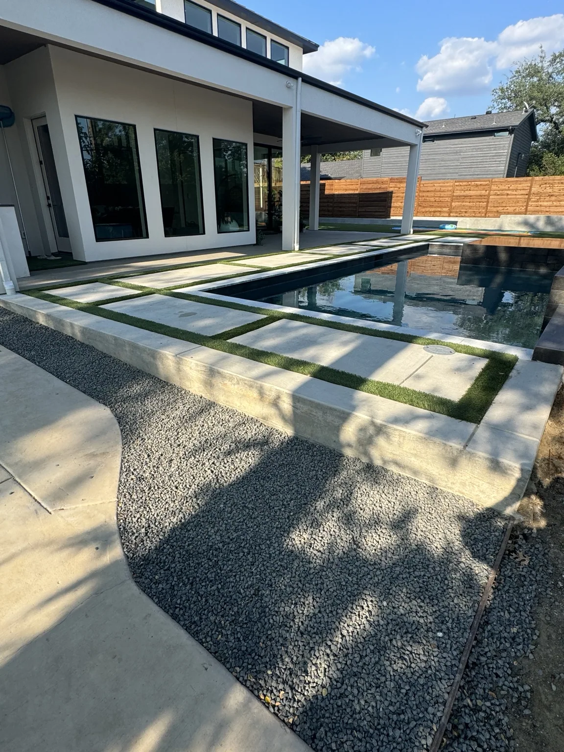 Poolside landscape and hardscape