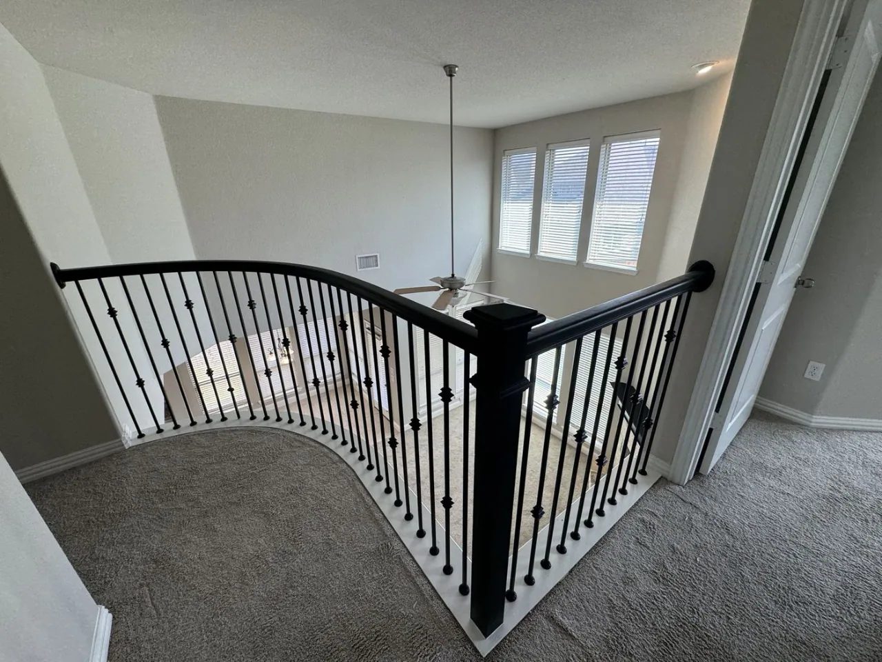Custom staircase and iron railing